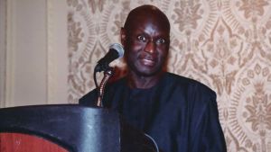 Olara Otunnu speaking on-stage