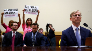 Protesters demonstrate on June 19, 2019 at a briefing on Capitol Hill by Brian Hook, the State Department's special representative on Iran. 