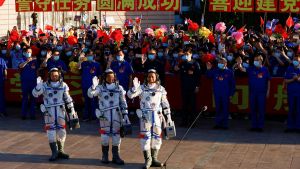 Chinese astronauts getting ready for rocket launch.