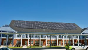 Solar panels on the roof of a multifamily residential building