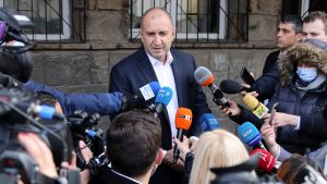 Bulgaria's incumbent President Rumen Radev being interviewed by press with microphones.