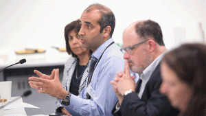 Executives engaging in conversation during an event