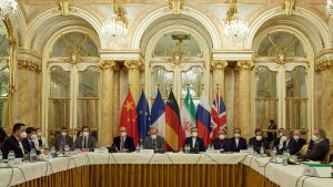 World leaders gather at a table in Vienna for talks to resume the JCPOA.