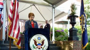 Ambassador Hartog Levin speaks at a podium at the annual Independence Day Reception at the Ambassador's Residence in The Hague.