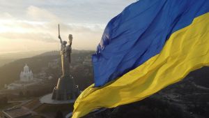 Ukraine flag and statue