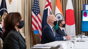 President Joe Biden, joined by Vice President Kamala Harris, Secretary of State Antony Blinken and White House staff, participates in the virtual Quad Summit in 2021.