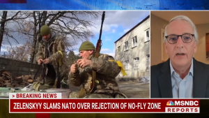 Screenshot of Ivo Daalder speaking on MSNBC next to images of soldiers.