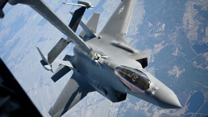Plane refueling while in air. 