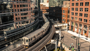 A Brown Line train rides along the CTA rails in Chicago.