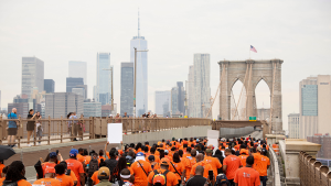 A protest against gun violence marches across the Brooklyn Bridge in New York City on June 2, 2022.