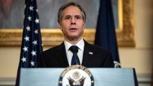 Anthony Blinken at a podium giving a speech