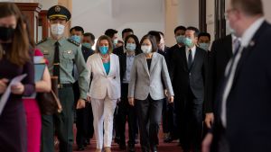 Nancy Pelosi walks with Taiwan's president