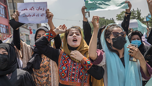 Afghan women demonstrate in the center of Kabul, Afghanistan, Saturday August 13, 2022. 