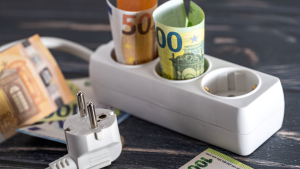 power strip and electricity plug with euro banknotes