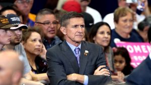 General Michael Flynn stands in a crowd during a political rally