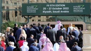 Participants arrive at the Future Investment Initiative (FII) conference in Riyadh, Saudi Arabia