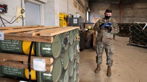 A US service member prepares cargo in support of Ukraine