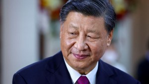 Xi Jinping seen from the shoulders up looking to his right.