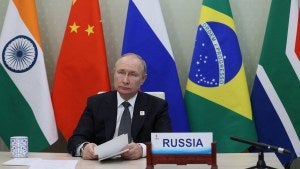 Russian President Vladimir Putin takes part in the 14th BRICS Summit