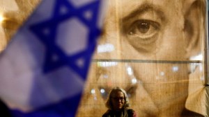 Israelis protest Prime Minster Benjamin Netanyahu's new right-wing coalition