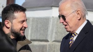 Zelenskyy and Biden shoulder shot, Z left and B right.