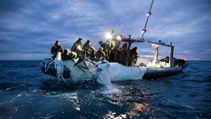 Sailors recover a high-altitude surveillance balloon off the coast of Myrtle Beach