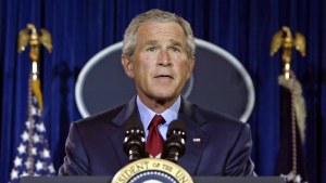 George W. Bush speaks at a lecturn
