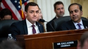 Representative Mike Gallagher and Representative Raja Krishnamoorthi before a House Select Committee on the Chinese Communist Party hearing 