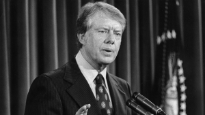 Jimmy Carter speaks at a lectern