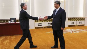 Antony Blinken (left) shakes hands with Xi Jinping in the Great Hall of the People in Beijing.