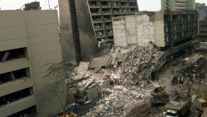 A view of the United States Embassy, left, and other damaged buildings in downtown Nairobi, Kenya on Aug. 8, 1998 the day after terrorist bombs in Kenya.