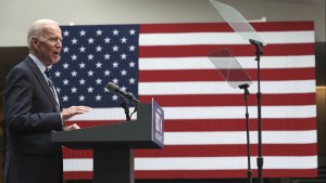 Candidate Joe Biden speaks in front of an American flag