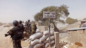 Cameroon soldiers stand guard at a lookout post as they take part in operations against the Islamic extremists group Boko Haram