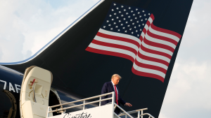 Former President Donald Trump stepping off his plane at Hartsfield-Jackson Atlanta International Airport on August 24, 2023.