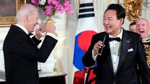 President Joe Biden reacts as South Korea's President Yoon Suk Yeol sings the song American Pie 
