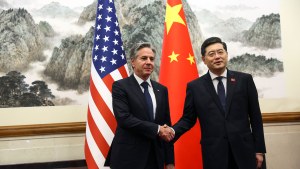 U.S. Secretary of State Antony Blinken shakes hands with Chinese Foreign Minister Qin Gang