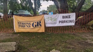 A sign marking Strong Towns bike parking