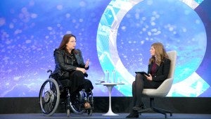 Senator Tammy Duckworth speaking with Elizabeth Shackelford.