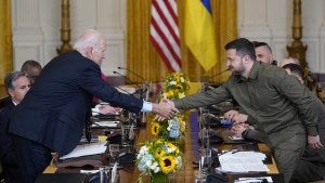 President Joe Biden shakes hands with Ukrainian President Volodymyr Zelenskyy as they meet in the East Room of the White House