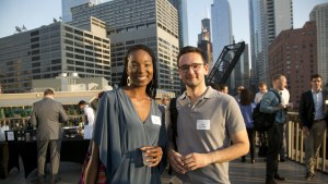 Two members of the Young Professionals Network at an outdoor event. 
