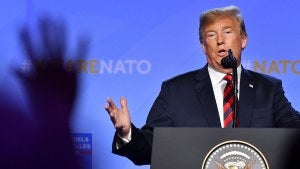 Donald Trump speaks during a press conference after a summit of heads of state and government at NATO headquarters