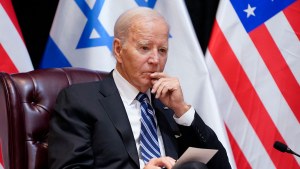 Biden listens during a meeting with Netanyahu