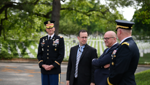 Andreas Michaelis (third from left) visits Arlington National Cemetery on May 8, 2024.