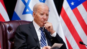 President Joe Biden listens as he and Israeli Prime Minister Benjamin Netanyahu participate in an expanded bilateral meeting