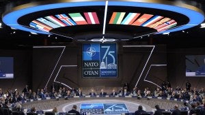 NATO leaders gather around a large table