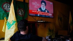 Lebanon citizens watching the news of explosions