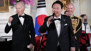 President Joe Biden reacts as South Korea's President Yoon Suk Yeol sings the song American Pie