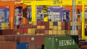 Shipping containers are stacked at a port in Tianjin, China