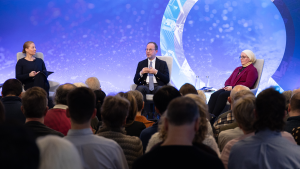 Alisa Bhachu, Zaher Sahloul, and Suzanne Akhras speak onstage at the Chicago Council Conference Center.