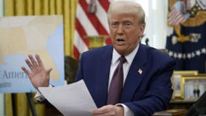 President Donald Trump speaks to reporters in the Oval Office